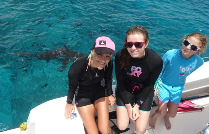 Jillian with the future marine biologist after their shark dive (Photo credit: Duncan Brake)