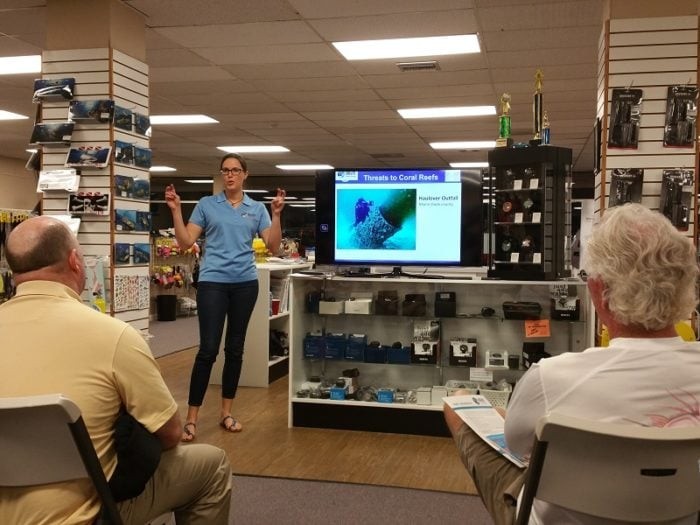 Meghan Balling discusses some of the stresses on Florida’s coral reefs including the Hallandale Outfall, where partially treated sewage spews into the Atlantic on a daily basis. Photo Credit: Branon Edwards