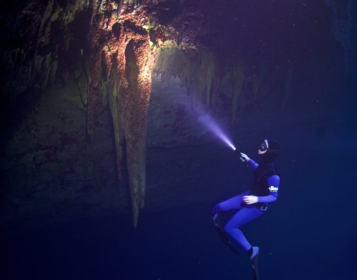 Freediving The Caves of Kefalonia - A stalactite in the dark