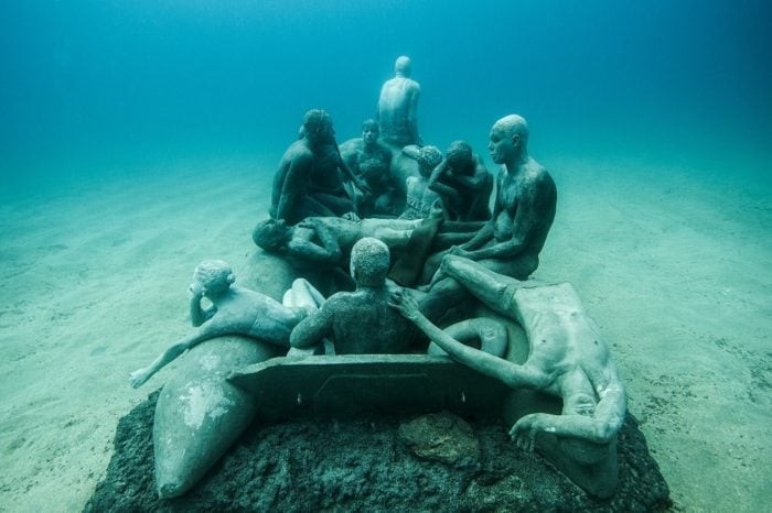 Raft of Lampedusa Sculpture and photograph by Jason DeCaires Taylor