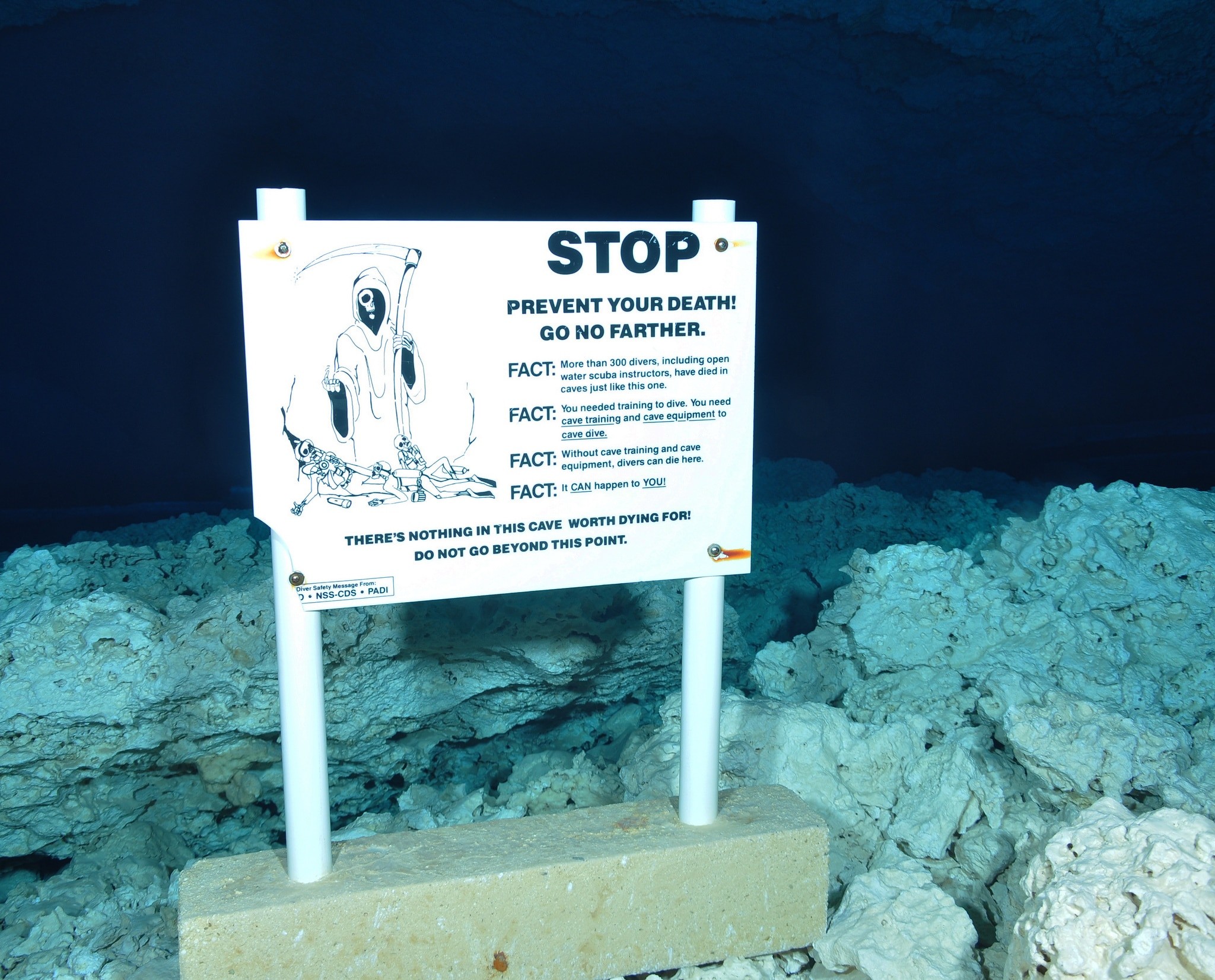 Cave Entrance Warning sign in Cenote cavern