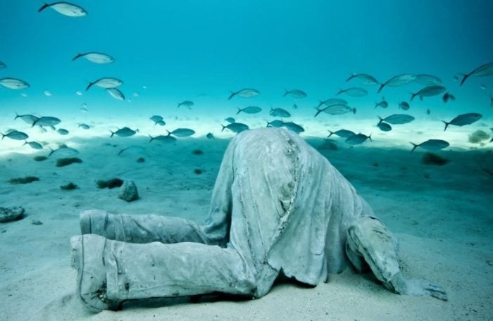 The Banker. Sculpture and photograph by Jason DeCaires Taylor