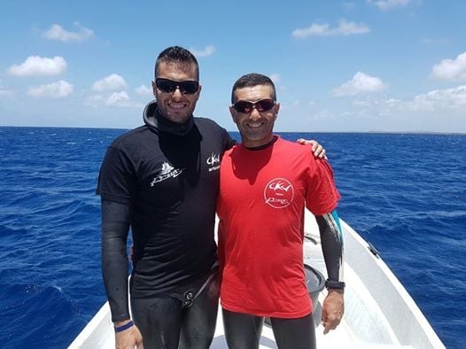 Deep man, Alfredo Roen (right) with dive buddy and compatriot, Elyoenai Aparicio Suárez.