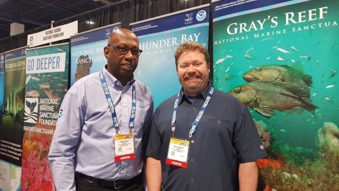 Vernon Smith Jr. and Tane R. Casserley from the NOAA Office of Marine Sanctuaries
