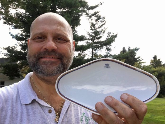 Richie Kohler with the china from the Andrea Doria