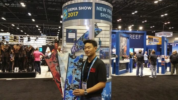 Kevin Sakuda displays Hammerhead's new colorful fins