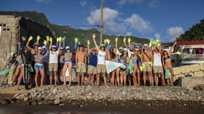 Blue Element athletes and crew lend a hand (or two!) for an annual beach clean up in Dominica (photo by Rajiv Smith-Mahabir)