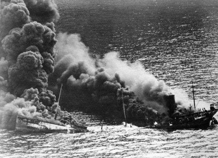 Dixie Arrow burning after being torpedoed by U-71. Photo: National Archives
