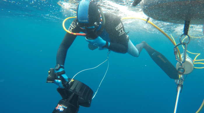 A PFI Diver breathing Nitrox prior to a dive
