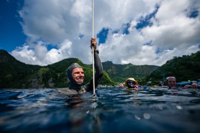 Thibault Guignes smiles on the surface after a 105m dive (photo by Daan Verhoeven)