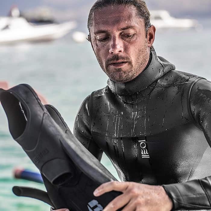 The RF1 vest shown over the RF1 suit, giving additional warmth whilst freediving and made with limestone neoprene. Photo Credit: Fourth Element