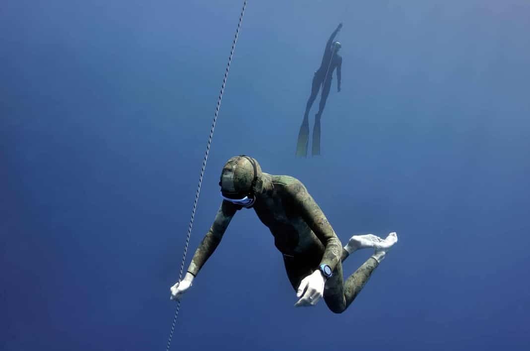 Freediver preparing to dive