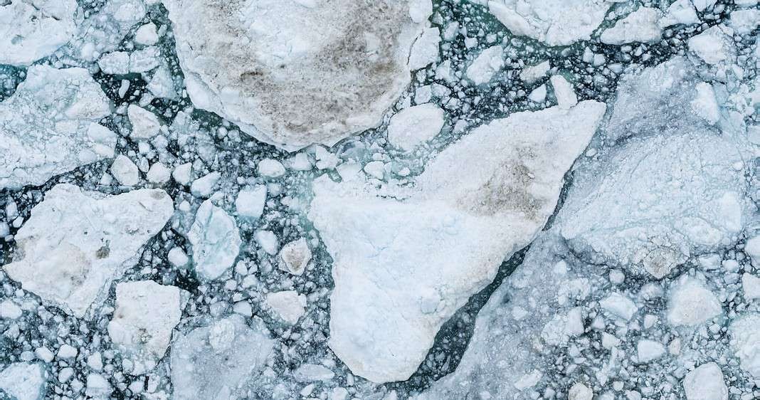 Icebergs drone aerial image top view - Climate Change and Global Warming