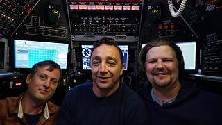 Alvin’s crew from inside the submersible’s sphere during its record-breaking dive. From left: WHOI mechanical engineer Fran Elder, WHOI Alvin pilot Anthony Tarantino, and NAVSEA certification authority Mike Yankaskas. (Image credit: Ken Kostel/Woods Hole Oceanographic Institution)