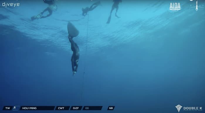 Taiwanese athlete Mia Hou performing a National Record dive with Taiwan’s acronym incorrectly displayed as 'TW' instead of 'TWN' and a broken image icon in place of Taiwan’s national flag