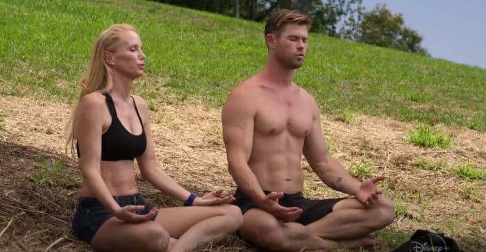 Tanya Streeter trains Chris Hemsworth on breath-hold techniques. (Image credit: Disney+/National Geographic)